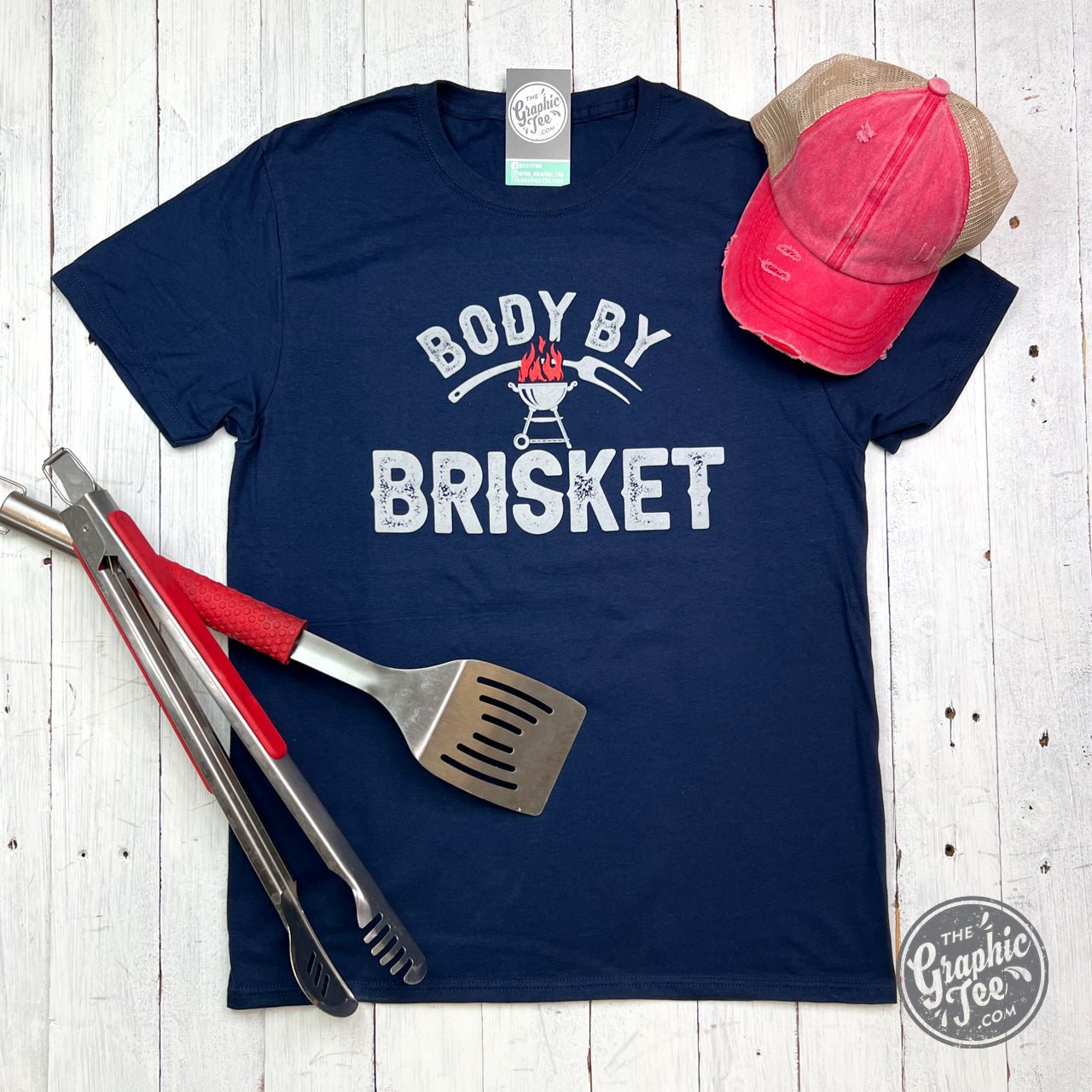 http://thegraphictee.com/cdn/shop/products/body-by-brisket-adult-tee-314905.jpg?v=1681419527