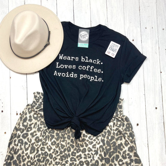 Wears black. Loves coffee. Avoids People. Black Unisex Short Sleeve Tee - The Graphic Tee