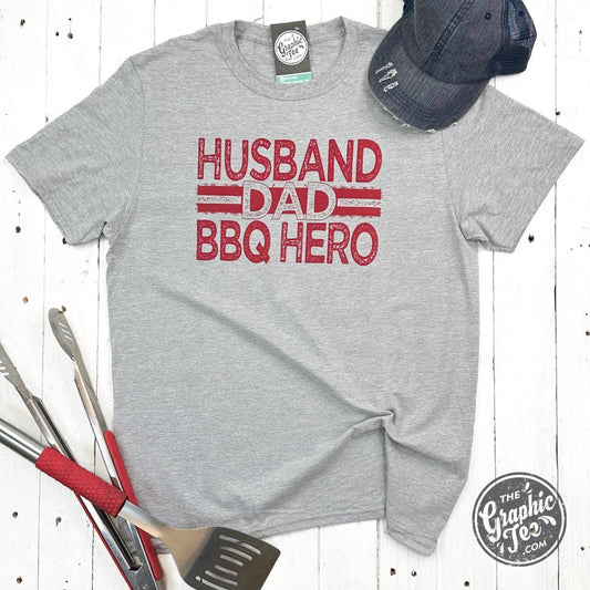 Husband. Dad. BBQ Hero. Short Sleeve Unisex Tee - The Graphic Tee
