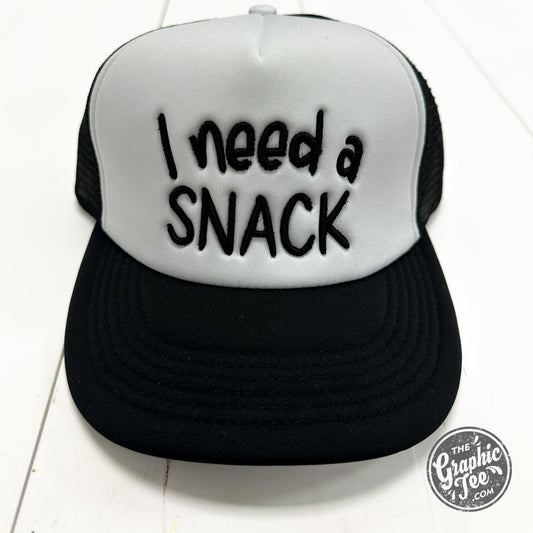 I Need A Snack Foam Trucker Cap - The Graphic Tee