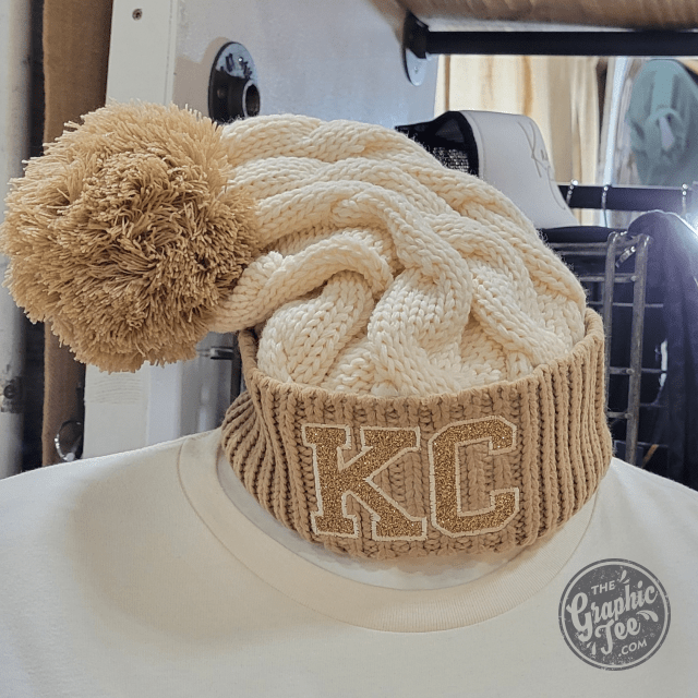 KC Glitter Applique Twist Knit Beanie with Pom - The Graphic Tee