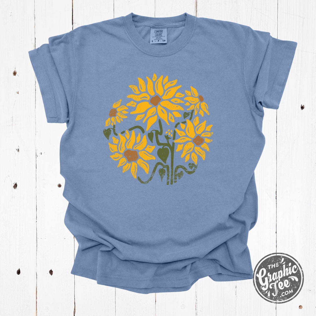 She Blooms in Sunshine Washed Denim Comfort Colors Short Sleeve Tee - The Graphic Tee