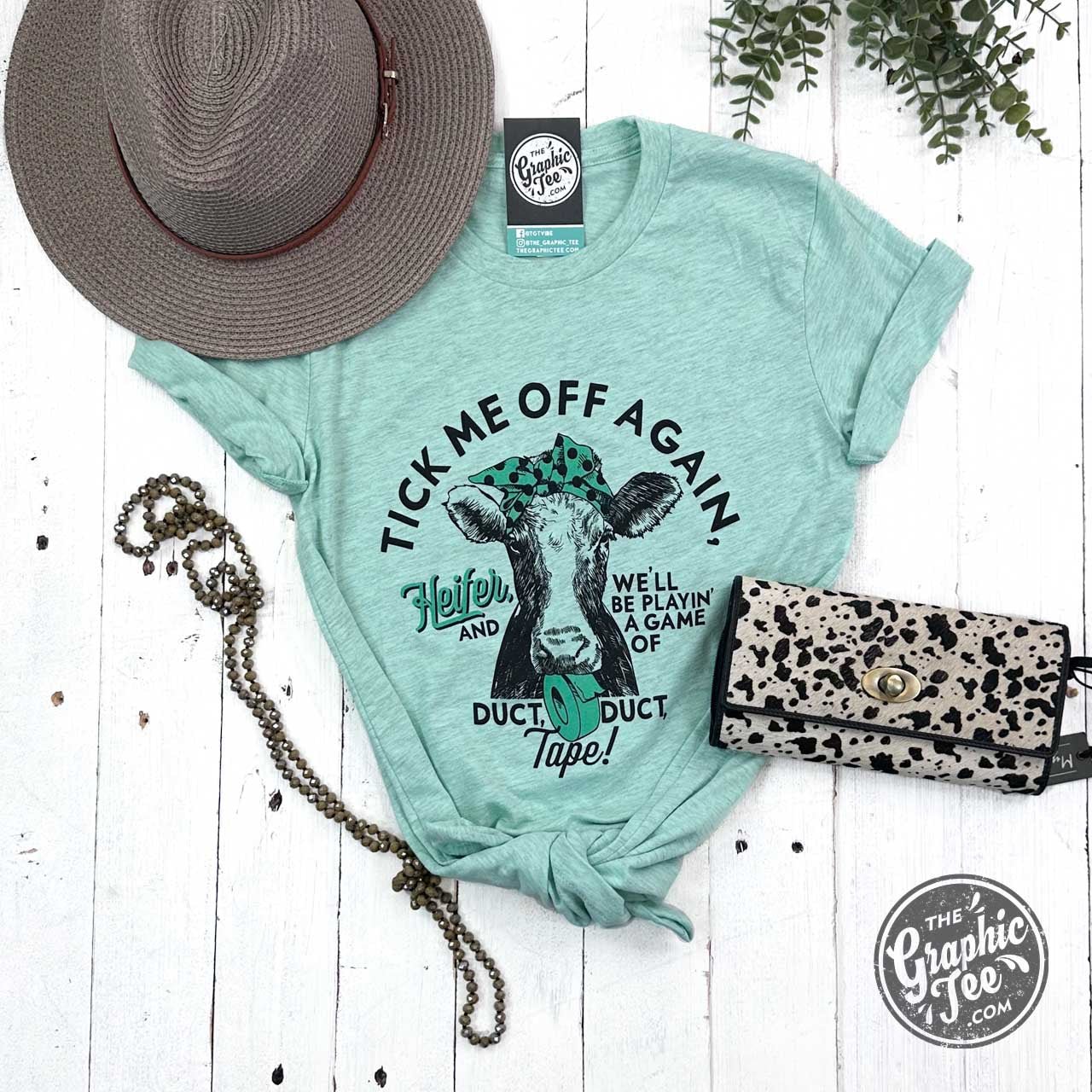 Tick Me Off Again, Heifer Short Sleeve Heather Prism Mint Tee - The Graphic Tee